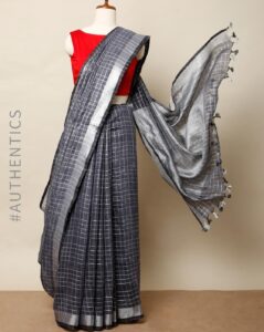 Woman wearing traditional Onam Kasavu saree – Weaveify