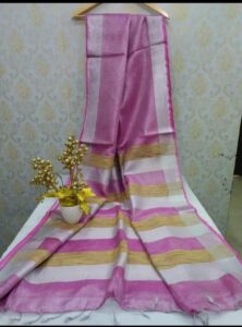 Linen saree drying on hanger in shade – Weaveify
