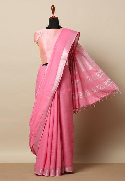 Woman wearing cotton saree styled for office wear – Weaveify