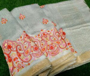 Woman wear linen embroidery work saree – Weaveify