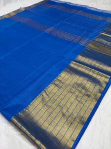 Bride wearing traditional silk wedding saree – Weaveify