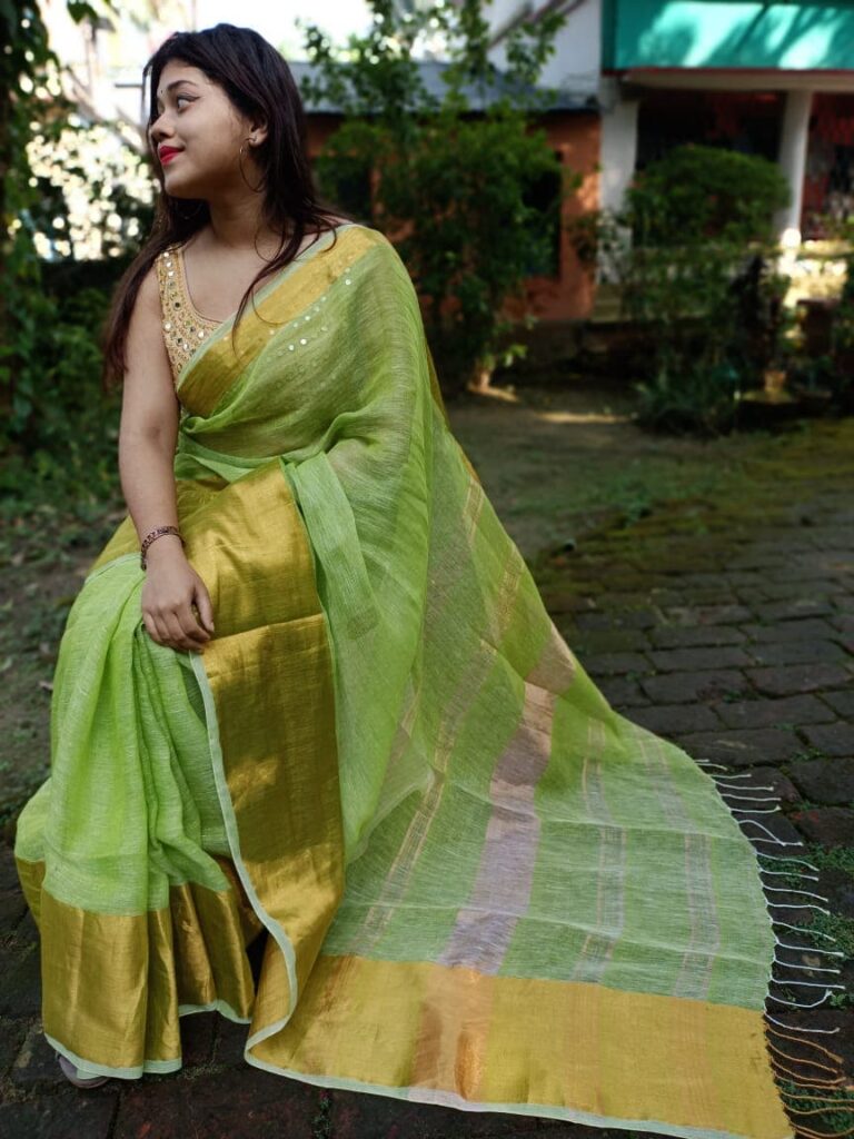 Woman wearing a linen saree for summer comfort