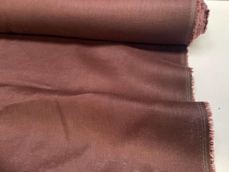 Handwoven Bhagalpur silk showcasing natural texture and golden sheen for luxury European apparel brands.